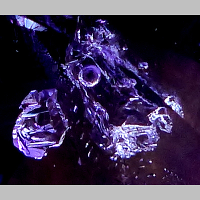 close up of enhydro in faceted amethyst from morocco