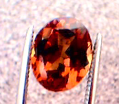 garnet_cc_220pt_oval_smky-orang_red-orange