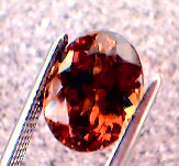 garnet_cc_244pt_oval_smky-orang_red-orange.jpg