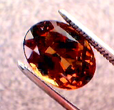 garnet_cc_273pt_oval_smky-orang_red-orange