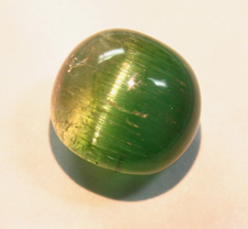 published rare bicolor tourmaline cat's eye