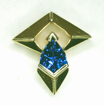 All That Glitters tanzanite set into custom pendant