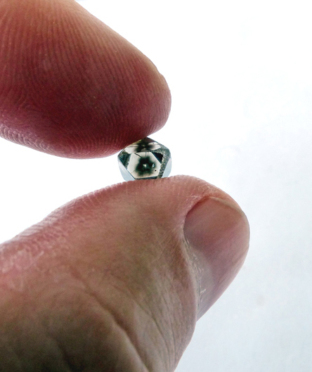 natural diamond crystal with hydrogen cloud
