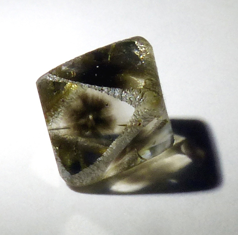 natural diamond crystal with hydrogen cloud