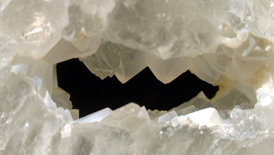 quartz geode slice with tourmaline crystals