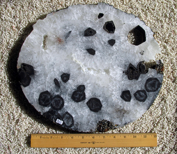 quartz geode slice with tourmaline crystals
